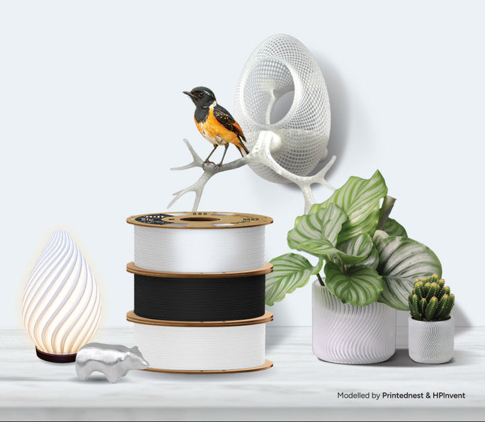 Advertisement for Overture PETG material with decorative items on a white background